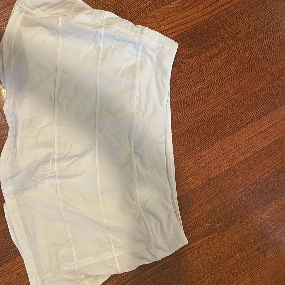 White lululemon skort. Size 10. See sticker for additional sizing information.